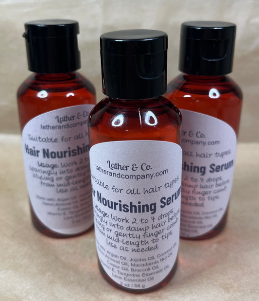 Hair Nourishing Serum by Lather & Co., each with a dropper cap.