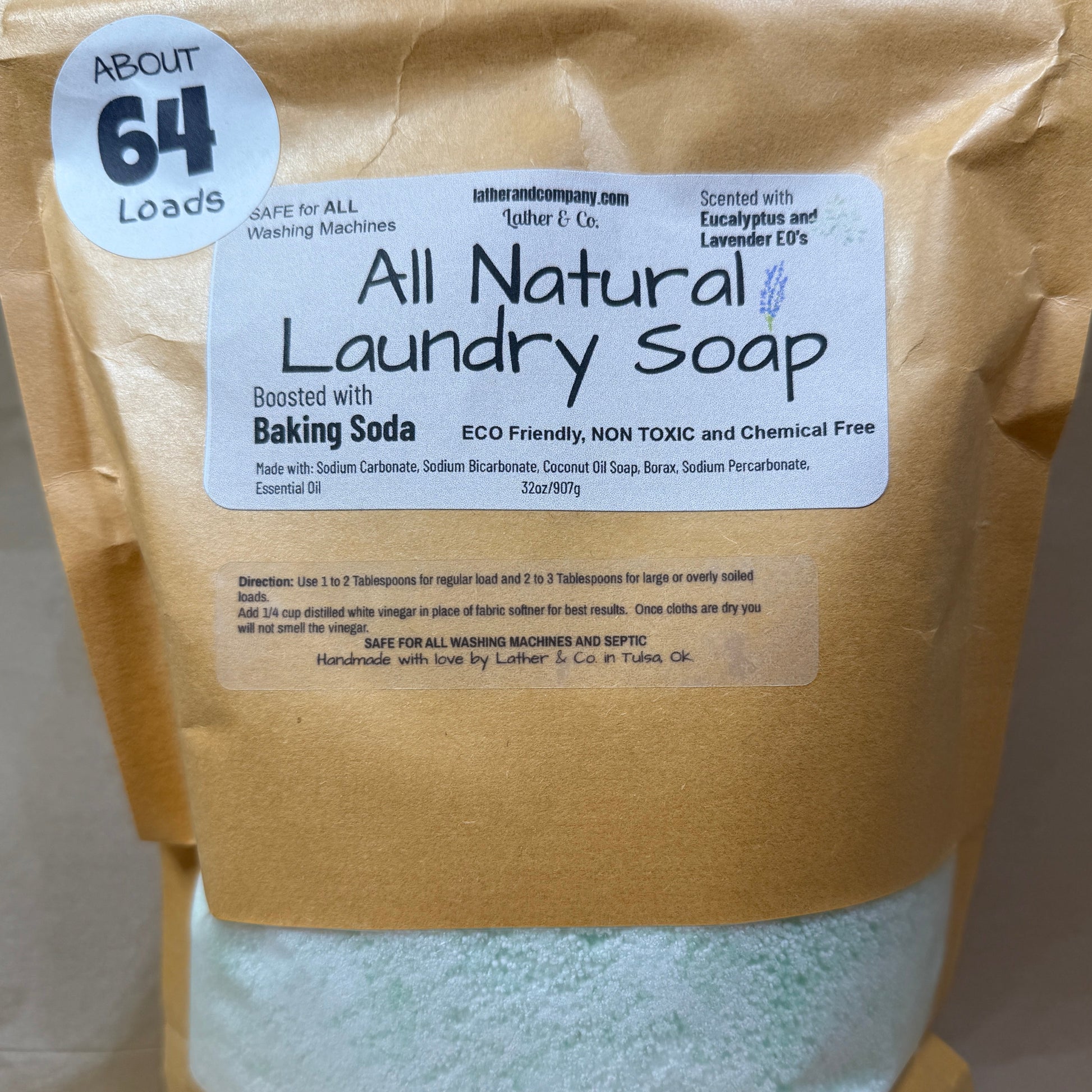 Bag of all natural laundry soap with a label on a neutral background